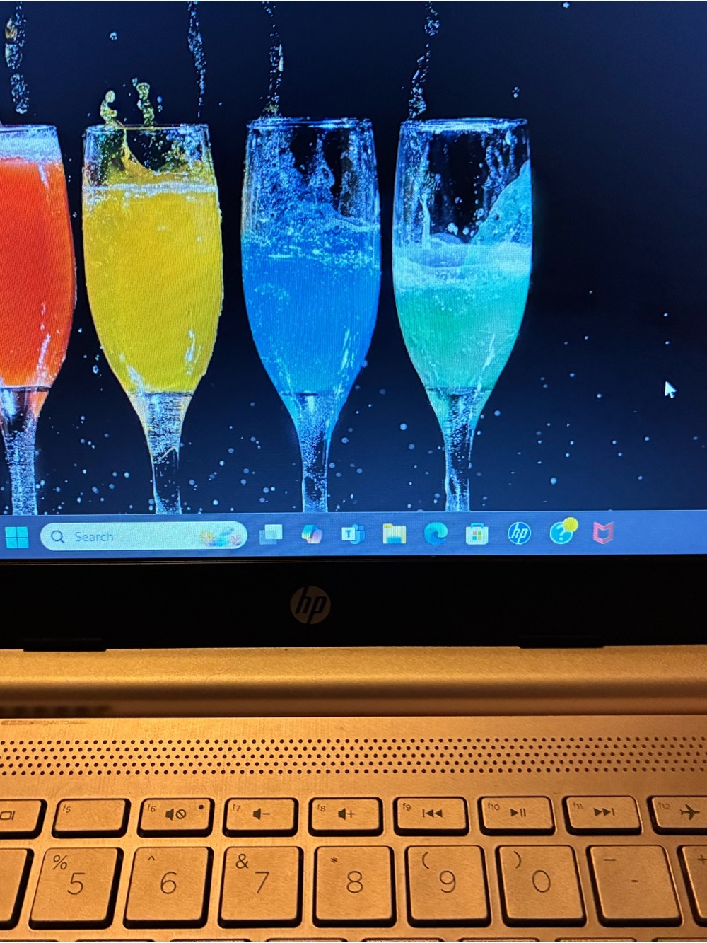 HP Laptop with Black Display Bezel and Gold Keyboard - Picture 2 of 8